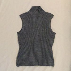 Woman’s knit sleeveless turtleneck top (only)